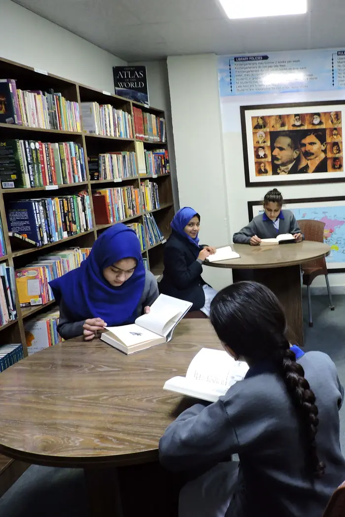 Girls reading in the library
